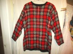 This is an 80s/90s mohair/acrylic blend knit, red and black plaid pullover sweater by Paul Harris Design. The sweater has a fuzzy finish, crew neckline, shoulder pads, and black ribbed knit narrow edge collar, cuffs and waist.     The sweater is in good condition with minor wear and no other problems to note. Tagged L Chest - 50 inches around the underarms Length - 30 1/2 inches down the front which is the shortest side. Sleeves - 33 inches from center back, across the shoulder to the end of the sleeve. 824 Plaid Crew Neck Sweater For Fall, Plaid Wool Sweater For Winter, Plaid Wool Tops For Winter, Winter Wool Plaid Tops, Oversized Plaid Sweater For Winter, Plaid Pullover, Plaid Sweater, Pullover Sweater Women, Red And Black Plaid