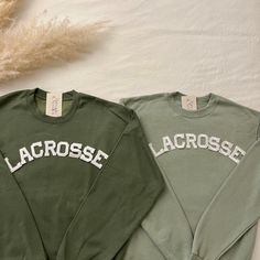 This Lacrosse Crewneck Sweatshirt is the perfect gift for Lacrosse lovers such as Lacrosse players / athlete or Lacrosse coach!  - They need to be purchased individually (it's not sold as a set) - Sweatshirt material is super soft and comfy! ♡ - All our sweatshirts run a UNISEX fit. (Both for men and women) They are naturally oversized, so we normally recommend your true size. But if you like a more baggy look, we recommend sizing up. - These letters are iron-on patched and is heat pressed, not Lacrosse Coach Gifts, Lacrosse Sweatshirt, Lacrosse Mom Shirts, Lacrosse Coach, Lacrosse Gifts, Lacrosse Team, Lacrosse Mom, Senior Gifts, Coach Gift