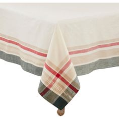 a table with a white and red checkered table cloth on top of the table