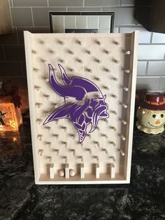 the minnesota state logo is displayed on an ice tray in front of a kitchen counter