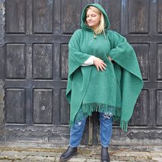 Wool blanket poncho cape, ruana One size fits all  -  men or women.  Available with hood or without hood Available in brown squares and gray (Charcoal/ Grey Salt & Pepper) 100% wool CARE: Hand-wash and hang to dry, light iron if needed, or dry clean. Length of poncho is 90cm or 35.5inch Length of arm (from neck to arm end) 60cm or 23.5inch this poncho is not open in the front. if you looking for open front poncho, please check our poncho SALA https://www.etsy.com/listing/1602118102/wool-blanket-poncho-with-hood-grey-or Oversized Hooded Cape For Cold Weather, Oversized Cape Poncho For Outdoor, Oversized Outdoor Cape Poncho, Outdoor Poncho With Cape Shape, One Size Poncho Cape For Outdoor, One Size Outdoor Poncho Cape, One Size Poncho For Outdoors, Hooded Green Cape For Fall, Green Hooded Cape For Fall