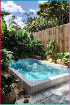 an outdoor swimming pool surrounded by greenery