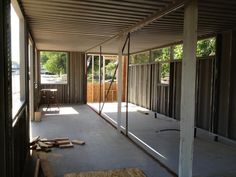 the inside of a house being built with wood and metal framing on the walls,