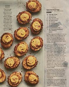 an article in the food and drink magazine features small pastries on a baking sheet