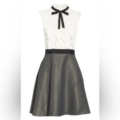 Ted Baker London Karoll Skater Dress, Black And White. Sharp, Classy, Sophisticated, Figure Flattering Retro Look. Pearlized Buttons Front Top. Standup Pleated Neck With Bow. Pleated Ruffles Down Front And Back. Side Zipper. Sleeveless. Sparkly Metallic Woven Skirt. 2 Hidden Side Pockets. Ted Baker Size 4, Equal To Us Size 10. Excellent Gently Used Condition. Worn 2 Times. No Damages, Stains, Marks, Rips. Smoke And Pet Free Home. Same Day Shipping! Elegant Mini Ruffle Dress For Daywear, Elegant Mini Length Ruffle Dress For Daywear, White Ruffled Mini Dress For Work, Elegant Mini Dress With Ruffles For Work, Chic Ruffle Dress For Work, Elegant Ruffled Mini Dress For Work, Elegant Daywear Mini Dress With Ruffles, Elegant Mini Dress With Ruffles For Daywear, Elegant Ruffled Mini Dress For Daywear