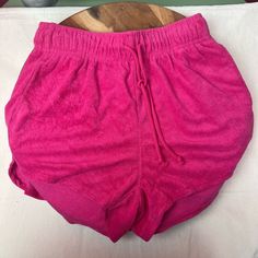 High-Rise Shorts With A Fuzzy Texture Made Of Soft Towel Terry Fabric For All-Day Comfort Drawstring Waist With Front Ties Provides A Snug Fit Casual-Fit Design With Dolphin Hems Side Pockets Add Functional Flair We Are Always Accepting Offers! Pink High-waisted Shorts For Loungewear, Pink Drawstring Bottoms Of Short Length, Pink Beachwear Bottoms With Pockets, Pink Relaxed Fit Workout Bottoms, Summer Workout Bottoms With Drawstring, Pink Summer Bottoms With Drawstring, Pink Drawstring Summer Bottoms, Summer Pink Bottoms With Drawstring, Summer Pink Drawstring Bottoms