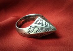 Old Touareg ring 1970s, hand-chiseled in solid silver, UNISEX. ** Size: 91/2 US // 62 FR. adjustable to the workshop according to request. ** Height: 1.5 cm. ** Materials: solid silver 900. ** Weight: 18.7 grams. ** Origin: Mali, 1970s. ** Shipping: free worldwide by DHL. This ring is vintage and not available in different sizes, in case your finger size is not 91/2 US, please contact me, then I will change its size in our workshop professionally. I am always open to offers for one of my items, Touareg Ring, Tuareg Jewelry, Ring Hand, Jewelry Antique, African Jewelry, Class Ring, Morocco, Not Available, 1970s