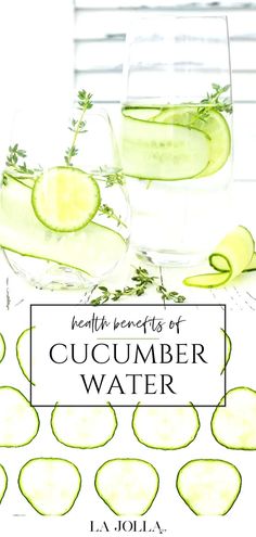 cucumber water with sliced cucumbers and herbs in glasses on a table