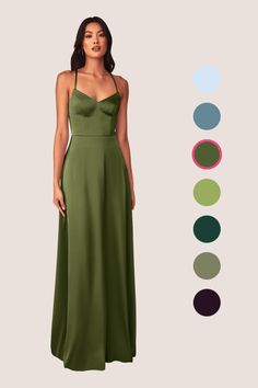 a woman wearing a green dress with different colors on it and the color chart below her