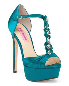 BETSEY JOHNSON Elizabeth Formal Teal Satin Platform T Strap Bridal Prom Dress Heels Sz 6.5 & 7 NIB A sky-high platform sandal will truly elevate your evening attire! With a sleek up the front style with bow and rhinestone detailing, the Elizabeth from Betsey Johnson is perfect for your next special occasion! The elizabeth dress sandal from betsey johnson are eye-catching with cute details like grosgrain bows, a slender ankle strap and stone embellishments. T-strap styling with an adjustable buck Teal Heels, Crystals Wedding, Formal Prom Dress, Dress Heels, Betsey Johnson Shoes, Satin Pumps, Peep Toe Shoes, Hot Shoes, Shoes Pumps