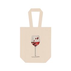 a bag with a wine glass drawn on the front and bottom, hanging from it's side