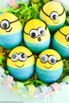 there are some decorated eggs in the shape of minion faces