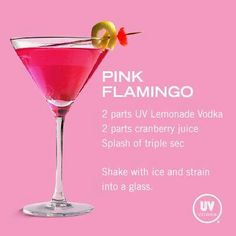 the pink flamingo cocktail is served in a martini glass with an olive garnish