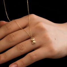 "14K Real Gold Bear Urn Pendant, Cremation Necklace For Ashes, Minimalist Bear Urn Necklace, Teddy Bear Urn Pendant, Sympathy Gift For Loss 🧸 D E T A I L S ------------------  ☆ Material: Solid Gold, real gold (not gold-filled or no gold-plated) ☆ Bear Height: 8 mm - 0.31 inches ☆ Bear Width : 11 mm - 0.25 inches ☆ Chain type: Cable (solid link) ☆ Chain width (mm): 0.72 mm, 0.84 mm ☆ Filling kit (funnel & pin) included There may be slight differences in measurements of the sizes due to handwork Bear Pendant Necklace, Cremation Necklaces For Ashes, Promise Necklace For Boyfriend, Dainty Hypoallergenic Initial Pendant Necklace, Ash Necklace Cremation Jewelry, Delicate Tiny Initial Pendant Necklace, Tiny Pendant Necklace For Anniversary, Teddy Bear Jewelry, Teddy Pendant