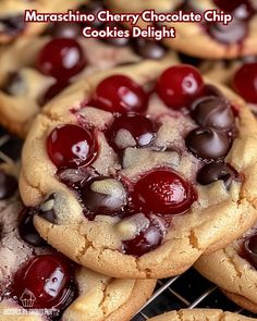 cookies with cherries and chocolate chips are cooling on a rack