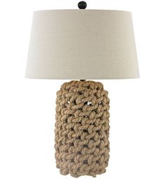 a crocheted lamp on a white background