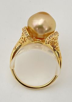 Luxury Gold Topaz Ring, Fine Jewelry Yellow Gold Pearl Ring With High Luster, Yellow Gold Pearl Ring With High Luster, Gold Topaz Ring With Diamond Accents In 14k Gold, Gold Rings With High Luster, Luxury Gold Pearl Ring With High Luster, Luxury Yellow Gold Pearl Ring Hallmarked, Luxury Gold Rings With High Luster, Luxury Gold Pearl Ring