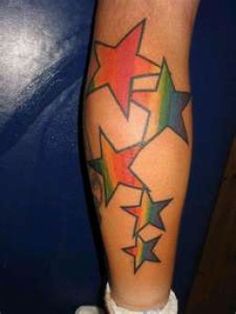 a person with colorful stars on their leg