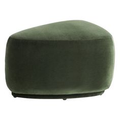 a large green ottoman sitting on top of a white floor