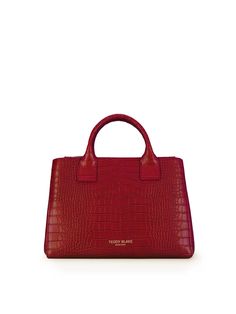 The Bella Croco satchel promises instant star status. Crafted in Italy from croco embossed calf skin, Bella Croco channels both classic&modern lines making it the perfect companion for today's woman.
Limited Edition By Teddy Blake Teddy Blake, How To Make Handbags, Free Bag, Luxury Handbags, Italian Leather, Embossed Leather, Dark Red, Luxury Branding, Leather Handbags