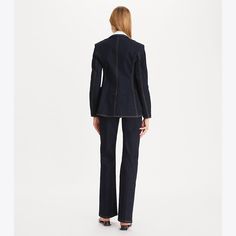 Instant icon: the classic single-button blazer, reimagined in denim. Pair it with a feminine skirt for contrast, or with jeans to create a casual suiting look. Feminine Skirt, Designer Jackets, Single Button Blazer, Denim Blazer, How To Stretch Boots, Poplin Dress, Blazer Fashion, Jacket Design, Blazer Buttons