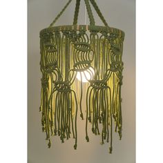 a green chandelier hanging from the ceiling