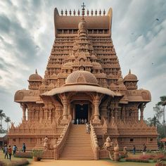 an elaborately designed temple with steps leading up to it