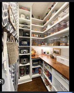 an open pantry with lots of food in it