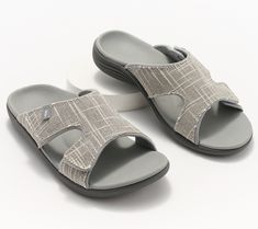 Easy to wear with a slip-on style, these slides are fashioned with an adjustable hook-and-loop closure, arch support, and metatarsal support. From RevitalignTM. Comfortable Gray Open Toe Sandals, Comfortable Slide Sport Sandals With Arch Support, Comfortable Adjustable Slides With Ortholite Insole, Comfortable Gray Slide Sandals, Adjustable Open Toe Slides With Ortholite Insole, Adjustable Slip-on Sport Sandals With Arch Support, Lightweight Open Toe Slides With Arch Support, Comfortable Slide Sandals With Arch Support, Comfortable Gray Sandals With Arch Support