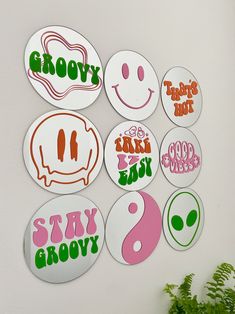 various stickers on the wall that say stay grooy and have different faces