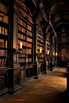 an old library with many bookshelves and candles on the shelves in front of them