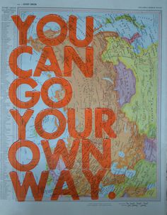 the words you can go your own way written in orange on an old world map