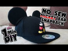 a mickey mouse hat with the words no sew mickey ear snapback