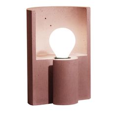 a light that is sitting on top of a shelf in the shape of a cube