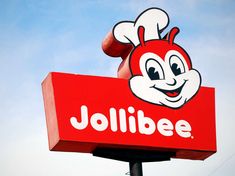 a jollibee sign with the word jollibee on it