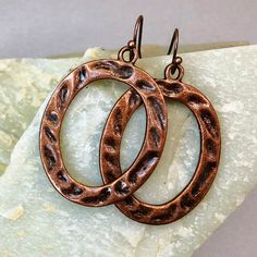 Large hammered copper hoop earrings. Striking statement earrings made with beautifully detailed copper hoops.  Trending now! Hypoallergenic ear wires (nickel and lead free) A gift for you or someone special, earrings are carded and in an organza bag. Link to my shop: https://www.etsy.com/shop/JezaJewelry Hammered Antiqued Copper Open Oval Earrings, Large Copper Outline Oval Earrings, Antique Copper Oval Earrings Hammered Bronze Metal Hoop Earrings, Bronze Hammered Metal Hoop Earrings, Artisan Bronze Copper Hoop Earrings, Small Hoop Hammered Copper Earrings, Vintage Hammered Copper Earrings, Special Earrings, Oval Earrings, Reno Nv, Earrings Antique