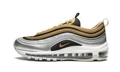 The Nike Air Max 97 is one of the most revered Nike running shoes of all time.  This special edition silhouette sees color blocking at its finest.  The upper sports a back mesh with silver and gold metallic overlays and a shiny silver mudguard.  Red branding hits the side panel and tongue, and a foil-infused heel loop completes the pair.  As it’s done for over two decades, the Nike Air Max 97 hosts a foam sole with full-length Max Air cushioning. Red Branding, Nike Running Shoes, Glitter Sneakers, Nike Air Max For Women, Air Max Women, Stadium Goods, Nike Womens, Running Shoes Nike, Nike Air Max 97