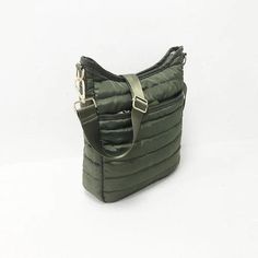 Stay light and stylish with our Champagne Lightweight Nylon Puffer Crossbody! Its zipper closure keeps your belongings secure while the Nylon material keeps it lightweight. Perfect for everyday wear. 10.6in x 3.5in x 11.8 inches. Nylon Crossbody Shoulder Bag With Zipper, Green Nylon Bags With Zipper Closure, Versatile Nylon Shoulder Bag With Zipper Closure, Outdoor Nylon Shoulder Bag With Zipper, Outdoor Nylon Shoulder Bag With Zipper Closure, Nylon Shoulder Bag With Zipper For Outdoor, Green Nylon Shoulder Bag With Zipper Closure, Green Quilted Shoulder Bag For Travel, Quilted Green Shoulder Bag For Travel