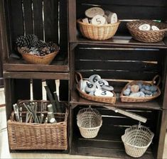 the shelves are filled with different types of items and baskets on top of each shelf