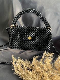 I carefully make my stylish looking pearl bags that you can easily use on your special days. ♡color black ♡%100 handmade  ♡the threads are unbreakable  ♡ıt has a long ♡We do not have a return option ♡produced in desired dimensions ♡ıf you have an questions, do not hesitate to ask questions. I am always happy to help those who visit my page and improve my products. Black Rectangular Evening Bag For Everyday Use, Trendy Black Square Evening Bag, Trendy Black Rectangular Evening Bag, Elegant Black Beaded Bags, Rectangular Black Clutch For Daily Use, Black Rectangular Clutch For Daily Use, Black Square Clutch For Party, Black Rectangular Evening Bag, Elegant Handmade Black Bag