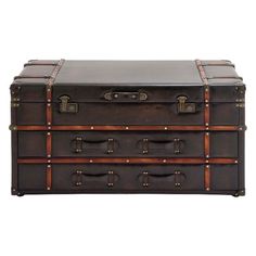 an old trunk is shown with leather handles and latches on the top, as well as brass hardware