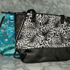 "Essential tote handbag with plenty of space. Side zippers make the accent and can be closed to make the bag smaller as well. Size: 14\" x 12\" x 4.5\" I do not claim ownership of the fabric design; the designs belong to respective copyrighted owners and the product is not related or affiliated with them. Please note that we are a pet loving home. Products will be cleaned thoroughly, however we do not recommend purchasing if allergic to cats or dogs." School Bags With Zipper Closure And Double Handle, Trendy Diaper Bag With Zipper Closure As Shoulder Bag, Trendy Diaper Bag With Zipper Closure, School Tote Bag With Zipper Closure, Shopping Tote Bag With Zipper Closure, School Satchel Bag With Zipper Pouch, Trendy Satchel Diaper Bag With Zipper Closure, School Tote Satchel With Zipper Closure, Black Diaper Shoulder Bag With Zipper Closure