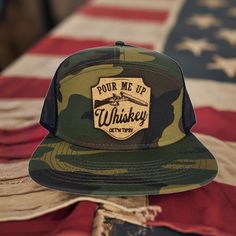 Elevate your outdoor style with the Pour Me Up Double Shot of Whiskey Get'n Tipsy Flat Bill Snapback by KORKIT Company featuring a precision-engraved cork patch, breathable lightweight mesh, and 7 Panel Construction. Front: 100% Cotton Back: 100% Polyester Mesh 7 Panel Structured 8 Rows Stitching on Visor Plastic Adjustable Snap Size: OSFM - Adult (58cm/22.8") Crown Height - Mid Profile: 8.6 cm / 3.4" Made In Usa Trucker Baseball Cap For Outdoor, Trucker Baseball Cap Made In Usa For Outdoor, Outdoor Trucker Baseball Cap Made In Usa, Outdoor Six-panel Trucker Hat With Leather Patch, Outdoor Snapback Trucker Hat Made In Usa, Made In Usa Snapback Baseball Cap For Outdoor, Outdoor Snapback Hat With Flat Bill Made In Usa, Shot Of Whiskey, Whiskey Shots