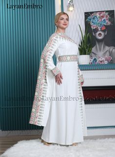 Multicolor Embroidered Kaftan For Eid Wedding, Floral Embroidered Abaya For Eid Wedding, Multicolor Embroidered Kaftan For Wedding And Eid, White Anarkali Maxi Kaftan, White Eid Dresses With Embroidered Border, Eid Wedding Multicolor Embroidered Kaftan, White Embroidered Dress For Eid, Traditional White Floor-length Abaya, Fitted White Kaftan With Intricate Embroidery