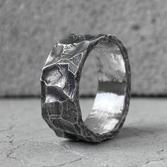 "At the moment we have difficulties with the payment system and we only accept payment through PAYPAL. When placing an order, select PAYPAL as a payment method. Otherwise, we will have to cancel your order. Thank you for understanding! ... WAVE Ring Material: 925 Sterling Silver Processing Type: volcanic oxidation +polishing DESCRIPTION: A wide annular strip with a texture resembling surging waves on the surface of the water. The texture of this ring reminded me of a storm in the ocean, so I dec Chunky Silver Rings Men, Men Stone Ring, Wide Band Ring, Man Silver Ring, Mans Ring, Ring Men, Rings Men, Silver Rings For Men, Men Ring