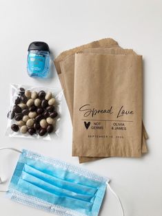 the contents of a disposable face mask are laid out on a table