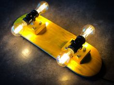 a skateboard with some lights on top of it