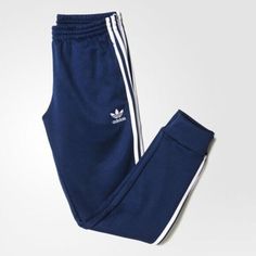 SUPER SPORTSWEAR BRAND NEW!   AUTHENTIC ADIDAS APPAREL ADIDAS ORIGINALS MEN'S SPORTSWEAR COLLECTION     SUPERSTAR CUFFED TRACK PANT   Men's Size: 2XL   Color: Collegiate Navy/White     Classic track pants get a style update with a slim fit and elastic leg cuffs for a modern look. Timeless track pants get a modern look. Updated with a slim fit and elastic leg cuffs, these men's pants show adidas pride with an embroidered Trefoil logo on one hip and 3-Stripes down the legs. They have side pockets