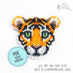 a close up of a tiger face made out of beads