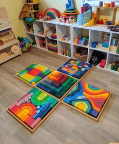 children's playroom with colorful wooden blocks and toys on the floor in front of them